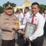 Polres Pasuruan Berikan Penghargaan kepada Anggota Berprestasi dalam Penegakan Hukum dan Kepatuhan JKN