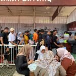Mewujudkan Slogan Polri untuk Masyarakat, Polres Pasuruan Bagikan Makan Gratis untuk Pemudik